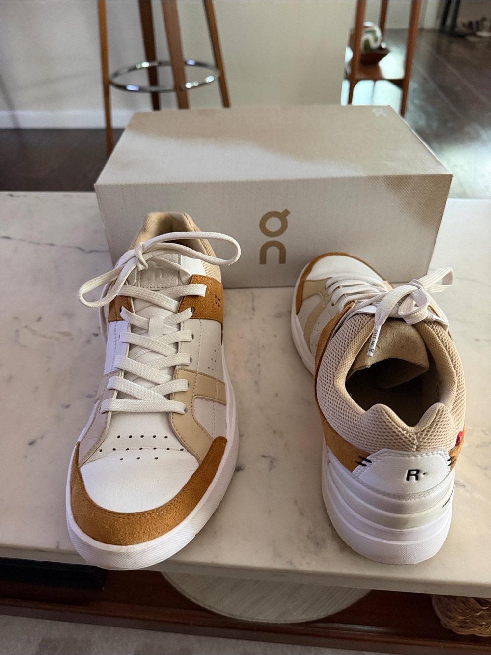 On Running women’s The Roger Federer White and Tan Low-Top Sneakers
